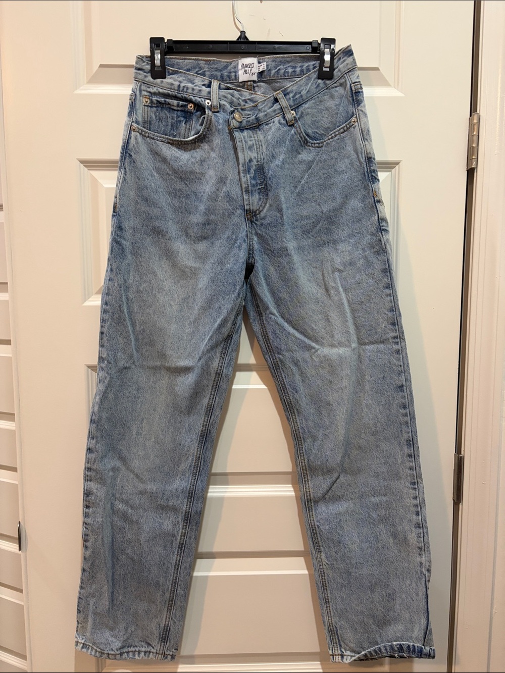 Princess Polly Denim light wash crossover waist button front jeans. Women’s Sz 6